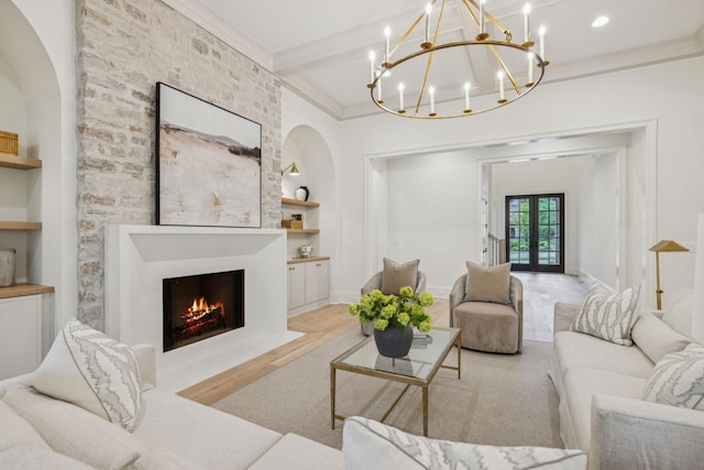 9314 Double Run Ct, College Grove, TN 37046 - living area with built in features, beam ceiling, french doors, a fireplace with flush hearth, and ornamental molding