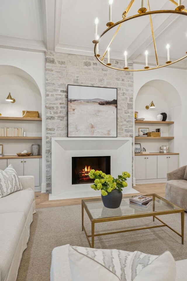 9314 Double Run Ct, College Grove, TN 37046 - living area with beamed ceiling, built in shelves, a lit fireplace, and a chandelier