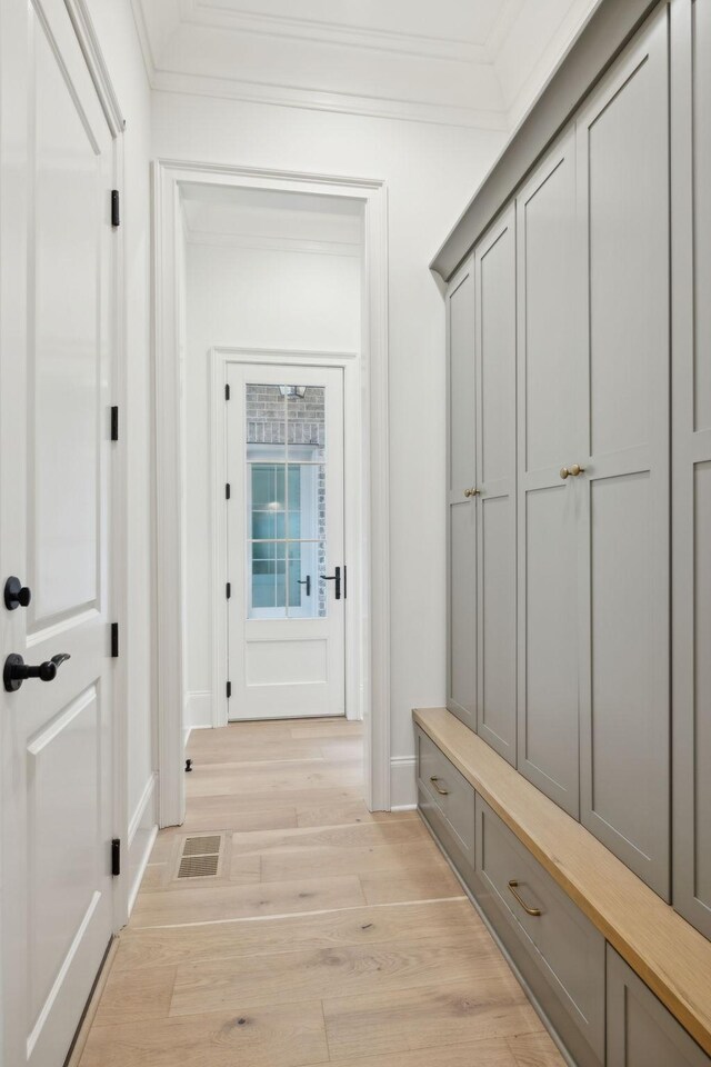9314 Double Run Ct, College Grove, TN 37046 - mudroom with ornamental molding, light wood-type flooring, and baseboards
