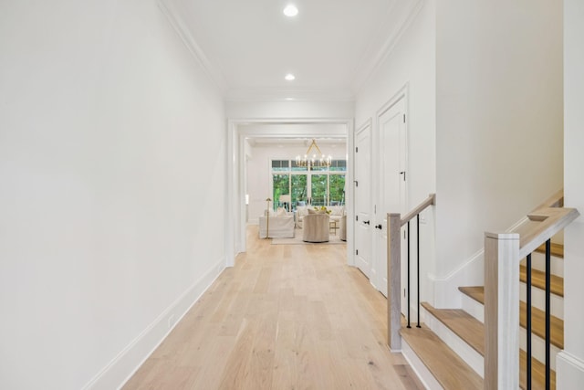 9314 Double Run Ct, College Grove, TN 37046 - hall featuring light wood-style floors, crown molding, a chandelier, stairway, and recessed lighting