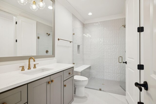 9314 Double Run Ct, College Grove, TN 37046 - bathroom with toilet, a stall shower, vanity, tile patterned flooring, and ornamental molding