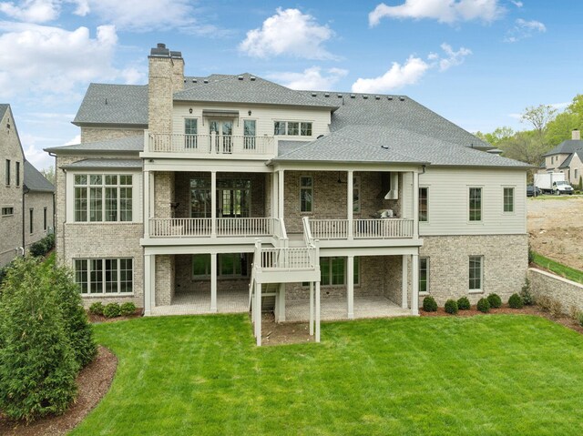 9314 Double Run Ct, College Grove, TN 37046 - back of property featuring a balcony, a patio, a lawn, and a chimney