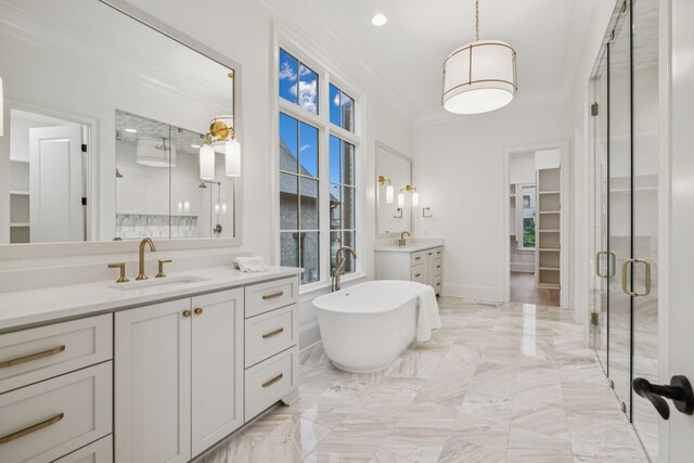 9314 Double Run Ct, College Grove, TN 37046 - bathroom with a shower stall, two vanities, ornamental molding, a soaking tub, and marble tiled flooring