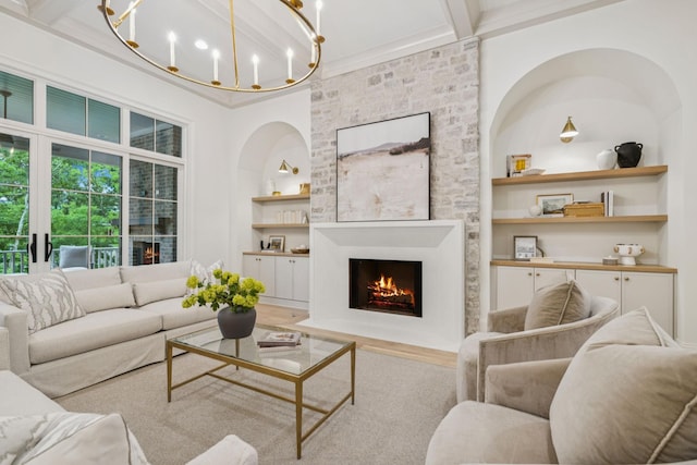 9314 Double Run Ct, College Grove, TN 37046 - living area featuring built in features, a large fireplace, crown molding, and a chandelier