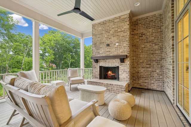 9314 Double Run Ct, College Grove, TN 37046 - wooden terrace featuring an outdoor living space with a fireplace, a ceiling fan, and view of scattered trees