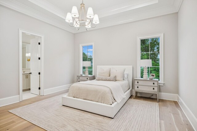 9314 Double Run Ct, College Grove, TN 37046 - bedroom with a chandelier, wood finished floors, ornamental molding, baseboards, and connected bathroom