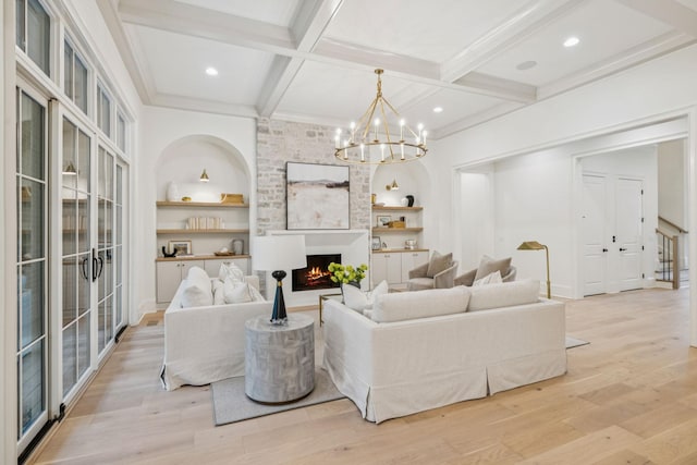 9314 Double Run Ct, College Grove, TN 37046 - living room featuring coffered ceiling, light wood-type flooring, built in shelves, beamed ceiling, and a chandelier