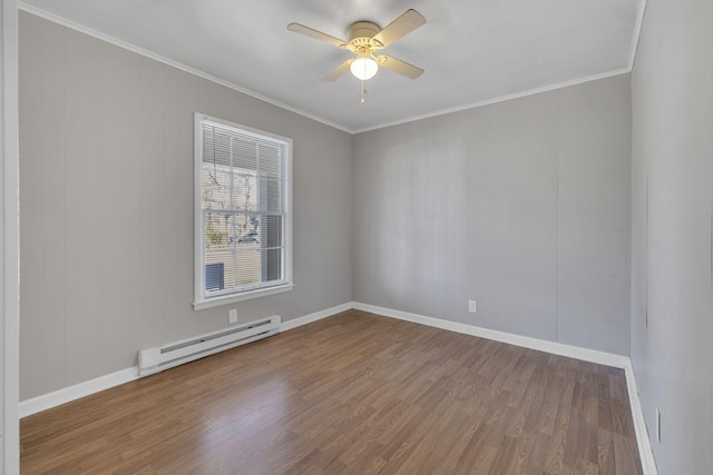 123 S Sam Davis Ave, Pulaski, TN 38478 - empty room with baseboard heating, wood finished floors, ornamental molding, ceiling fan, and baseboards