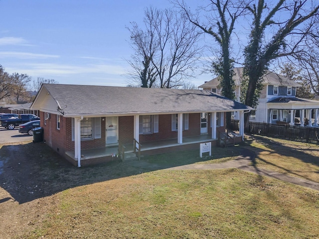 123 S Sam Davis Ave, Pulaski, TN 38478 - view of front of home featuring a porch, brick siding, and roof with shingles