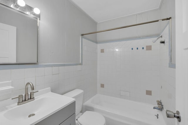 123 S Sam Davis Ave, Pulaski, TN 38478 - full bathroom featuring toilet, vanity, bathtub / shower combination, and tile walls