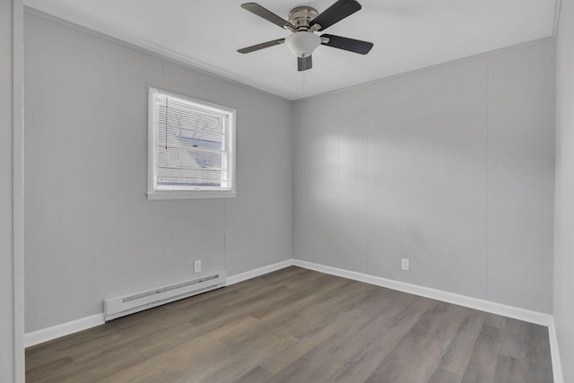 123 S Sam Davis Ave, Pulaski, TN 38478 - unfurnished room featuring a baseboard radiator, wood finished floors, ceiling fan, and baseboards