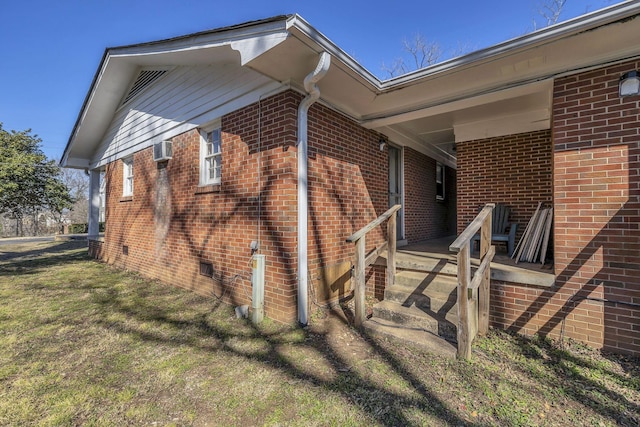 123 S Sam Davis Ave, Pulaski, TN 38478 - view of side of property featuring brick siding, crawl space, and a lawn