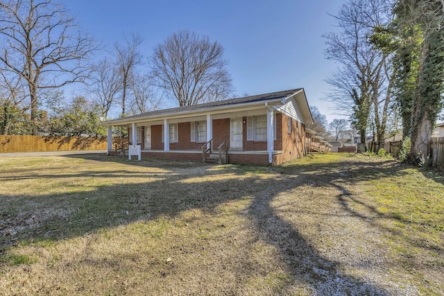 123 S Sam Davis Ave, Pulaski, TN 38478 - view of front facade featuring a porch and brick siding