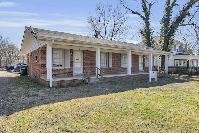 123 S Sam Davis Ave, Pulaski, TN 38478 - ranch-style house featuring brick siding, a porch, and roof with shingles