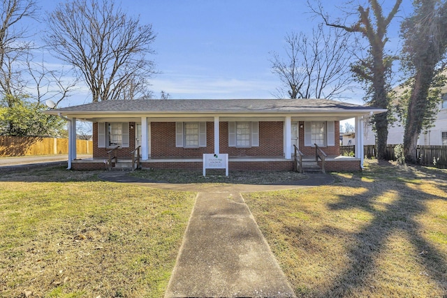 123 S Sam Davis Ave, Pulaski, TN 38478 - ranch-style house with a porch and brick siding