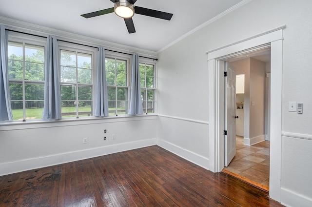 213 Maple St, Bell Buckle, TN 37020 - unfurnished room featuring a ceiling fan, plenty of natural light, dark wood finished floors, and crown molding