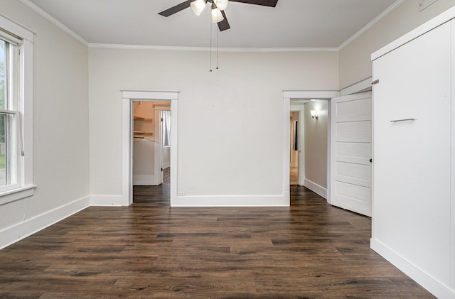 213 Maple St, Bell Buckle, TN 37020 - unfurnished bedroom with ornamental molding, dark wood-style flooring, baseboards, and a ceiling fan