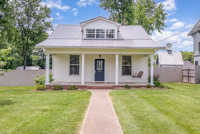 213 Maple St, Bell Buckle, TN 37020 - view of front of house with a porch and metal roof
