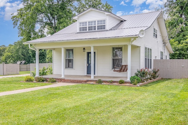 213 Maple St, Bell Buckle, TN 37020 - view of front facade featuring covered porch and metal roof