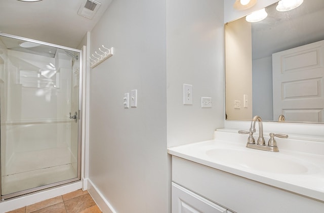 213 Maple St, Bell Buckle, TN 37020 - full bathroom featuring a stall shower, vanity, tile patterned floors, and baseboards