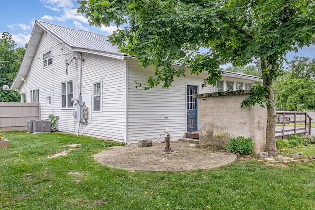 213 Maple St, Bell Buckle, TN 37020 - back of house with cooling unit and metal roof