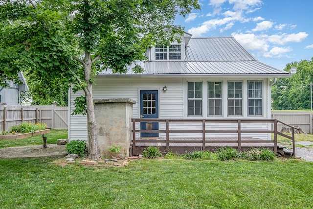 213 Maple St, Bell Buckle, TN 37020 - rear view of property with metal roof and a deck