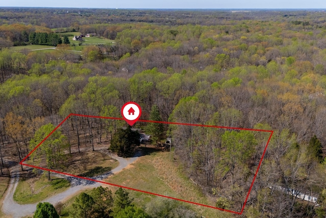 201 Welker Rd, Cedar Hill, TN 37032 - aerial view of property and surrounding area featuring a heavily wooded area and property boundaries highlighted