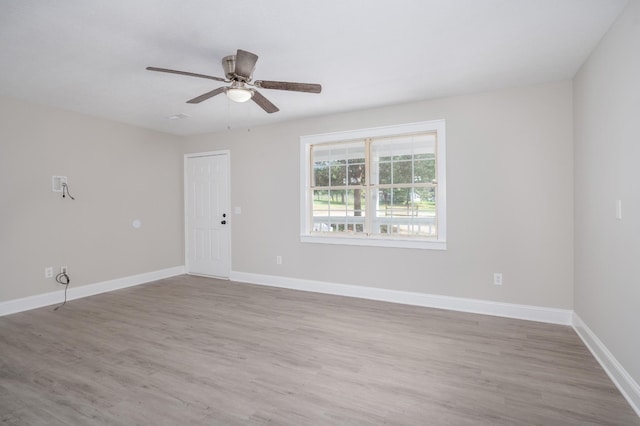 201 Welker Rd, Cedar Hill, TN 37032 - empty room featuring wood finished floors, a ceiling fan, and baseboards
