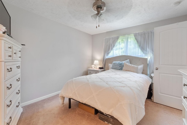 5104 Preserve Blvd, Antioch, TN 37013 - bedroom with light carpet, a textured ceiling, ceiling fan, and baseboards