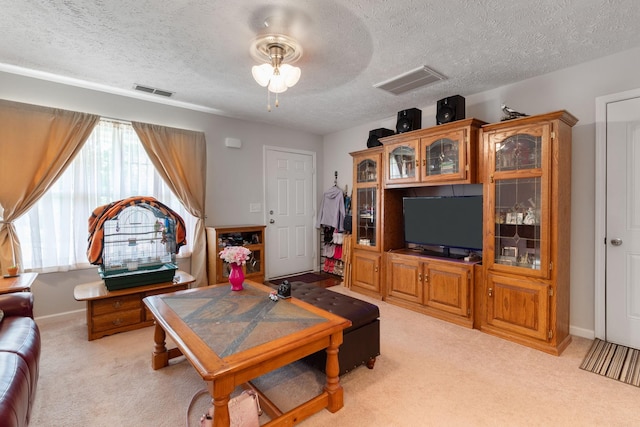 5104 Preserve Blvd, Antioch, TN 37013 - living area with light colored carpet, a textured ceiling, and ceiling fan