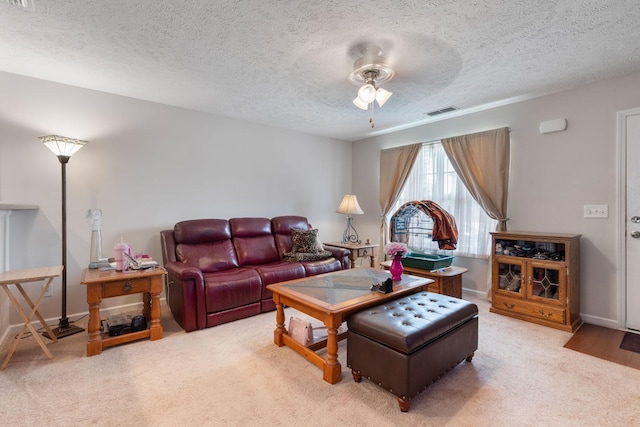 5104 Preserve Blvd, Antioch, TN 37013 - living area with light carpet, a textured ceiling, ceiling fan, and baseboards