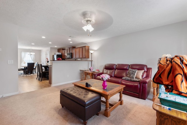 5104 Preserve Blvd, Antioch, TN 37013 - living room with light colored carpet, ceiling fan, a chandelier, recessed lighting, and baseboards