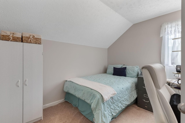 5104 Preserve Blvd, Antioch, TN 37013 - bedroom featuring vaulted ceiling, a textured ceiling, and light colored carpet