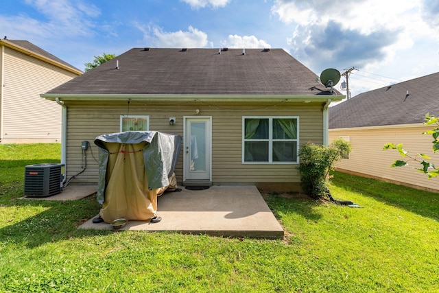 5104 Preserve Blvd, Antioch, TN 37013 - rear view of house with central AC unit, a lawn, a patio area, and roof with shingles
