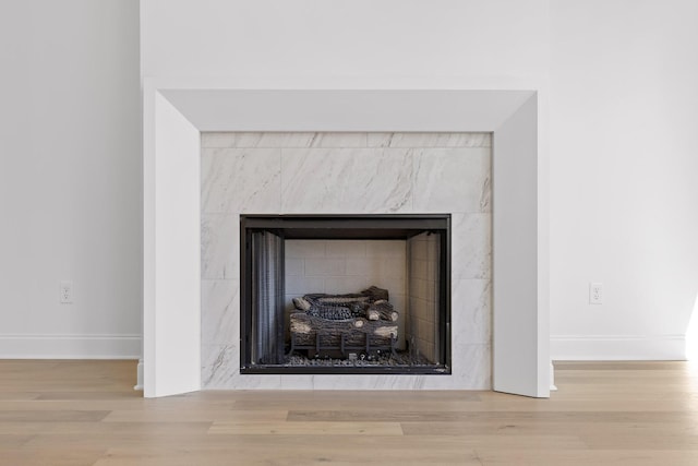4712 Dempsey Way, Chattanooga, TN 37419 - detailed view of a high end fireplace, wood finished floors, and baseboards