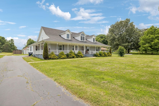 834 Union Camp Rd, Lafayette, TN 37083 - view of front of property with a porch, a front yard, and asphalt driveway