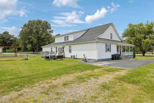 834 Union Camp Rd, Lafayette, TN 37083 - rear view of property with roof with shingles, a wooden deck, and central AC
