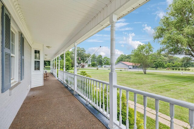834 Union Camp Rd, Lafayette, TN 37083 - covered porch with a yard