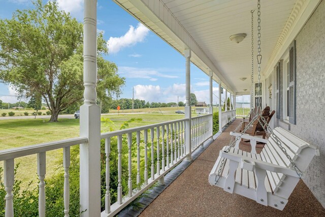 834 Union Camp Rd, Lafayette, TN 37083 - covered porch featuring a yard