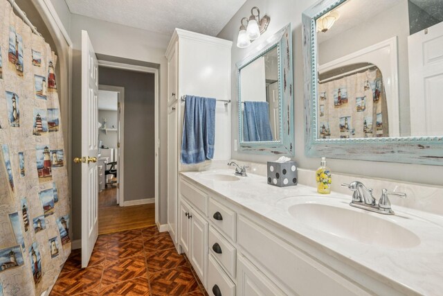 834 Union Camp Rd, Lafayette, TN 37083 - bathroom with double vanity, baseboards, and a shower with shower curtain