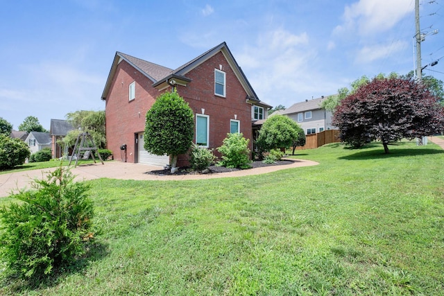 5000 Loch Lorne Ct, Mount Juliet, TN 37122 - view of side of home with an attached garage, concrete driveway, and brick siding