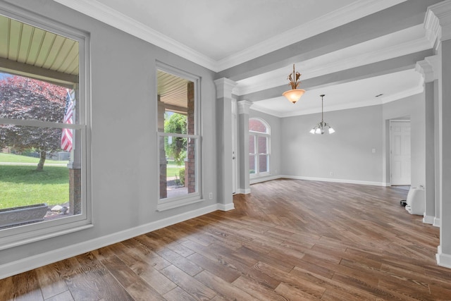 5000 Loch Lorne Ct, Mount Juliet, TN 37122 - spare room featuring ornate columns, hardwood / wood-style flooring, a chandelier, and crown molding