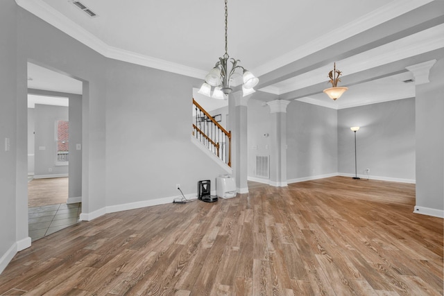 5000 Loch Lorne Ct, Mount Juliet, TN 37122 - unfurnished living room with wood finished floors, stairway, crown molding, ornate columns, and a chandelier