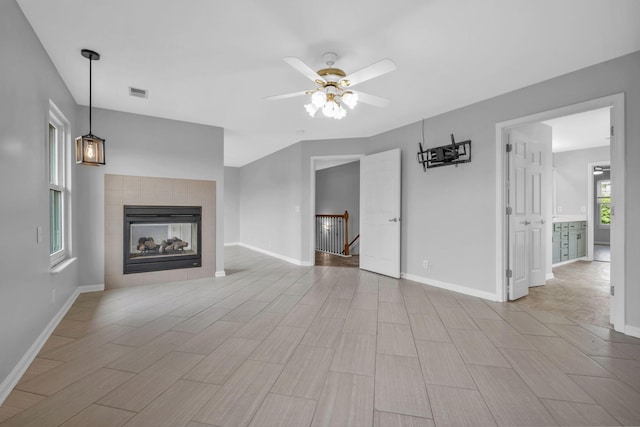 5000 Loch Lorne Ct, Mount Juliet, TN 37122 - unfurnished living room with a ceiling fan, light wood-style floors, and a fireplace