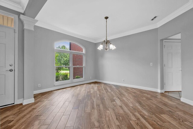 5000 Loch Lorne Ct, Mount Juliet, TN 37122 - empty room featuring wood finished floors, a chandelier, and ornamental molding