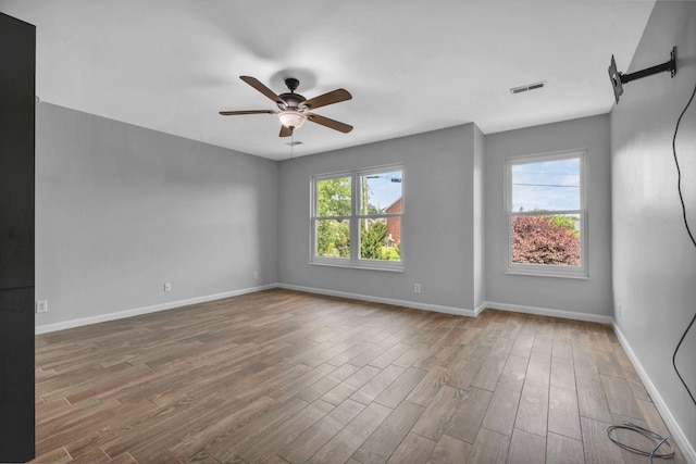 5000 Loch Lorne Ct, Mount Juliet, TN 37122 - unfurnished room with plenty of natural light, wood finished floors, and a ceiling fan