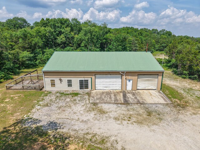 417 Haskins Chapel Rd, Lewisburg, TN 37091 - detached garage featuring a wooded view