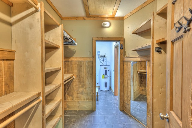 417 Haskins Chapel Rd, Lewisburg, TN 37091 - spacious closet featuring water heater and dark tile patterned floors
