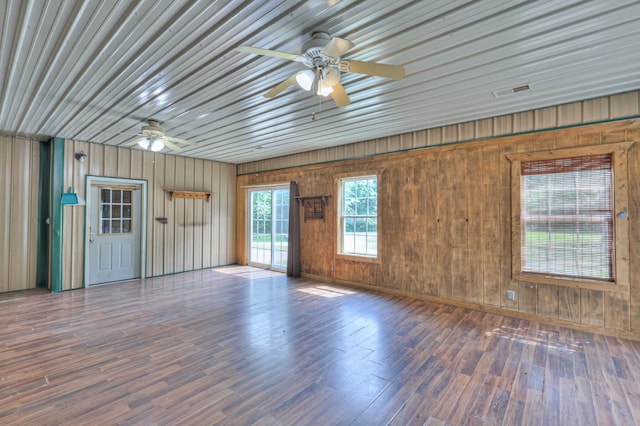 417 Haskins Chapel Rd, Lewisburg, TN 37091 - unfurnished living room with ceiling fan, wood finished floors, and wood walls
