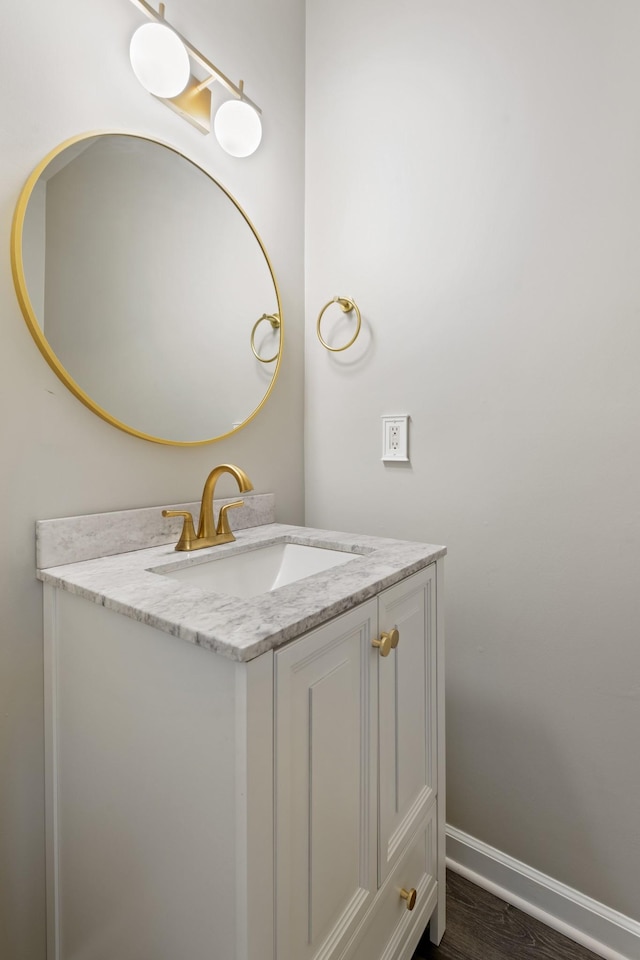 127 Carriage Ct, Brentwood, TN 37027 - bathroom with vanity, baseboards, and wood finished floors